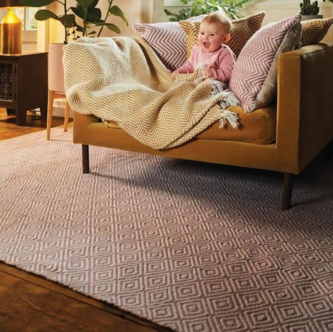 When Using A Rug To Create A Warmer Living Room
